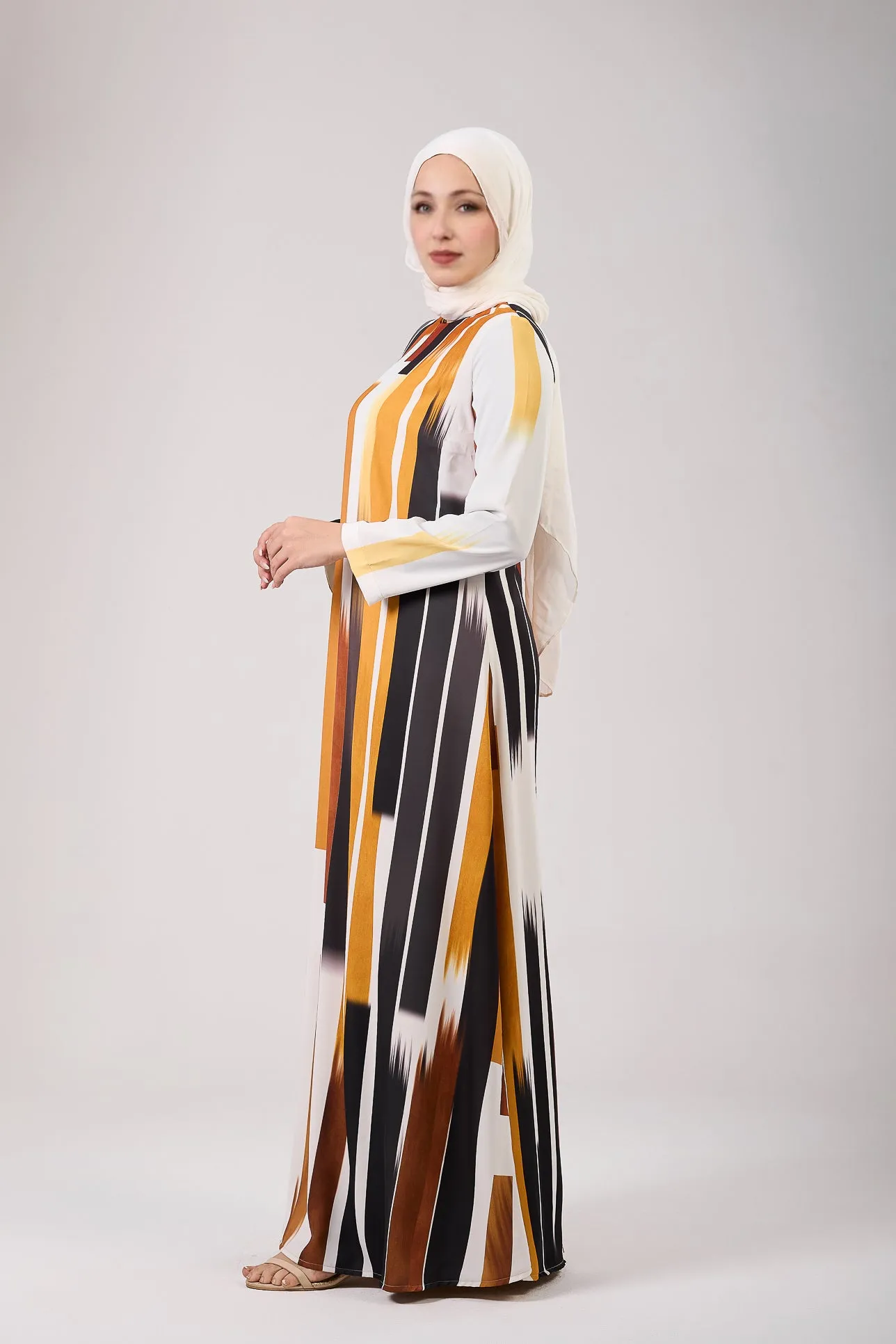 Feryal Timeless Elegance Satin Maxi Dress with Linear Patterns